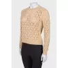 Jumper with a cut -out pattern