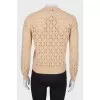 Jumper with a cut -out pattern