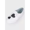 Slip-ons with heart-shaped inserts