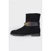Leather boots with a gold chain