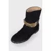Leather boots with a gold chain