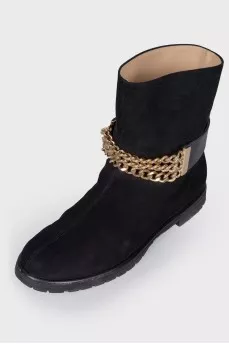 Leather boots with a gold chain