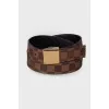 Leather belt with a brand logo