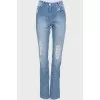 Jeans with decorative fading