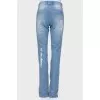 Jeans with decorative fading