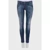 Jeans with decorative scuffs