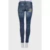 Jeans with decorative scuffs