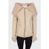 White sheepskin coat with a zipper
