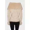 White sheepskin coat with a zipper
