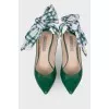 Green shoes with a checkered bow