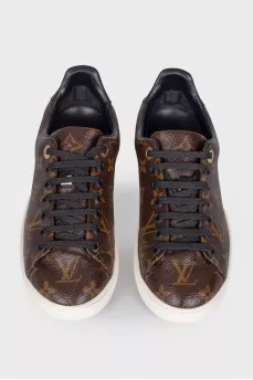 Sneakers with the brand's signature print