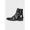 Boots with straps and spikes