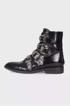 Boots with straps and spikes