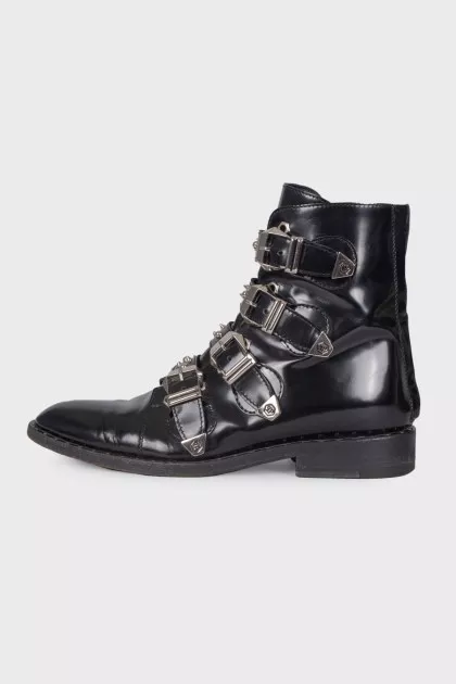 Boots with straps and spikes