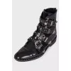Boots with straps and spikes