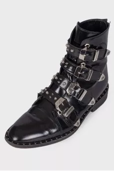 Boots with straps and spikes