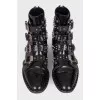 Boots with straps and spikes