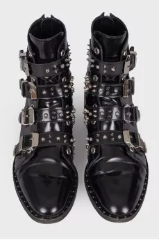 Boots with straps and spikes