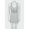 Top with rhinestone appliqué