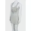 Top with rhinestone appliqué