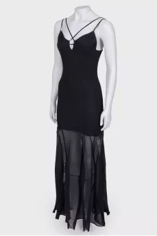 Black floor-length dress with a tag