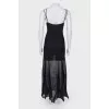 Black floor-length dress with a tag