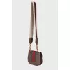 Bag with appliqué and wide strap