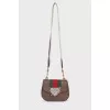 Bag with appliqué and wide strap