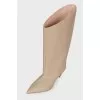 Pointed heel leather boots with tag