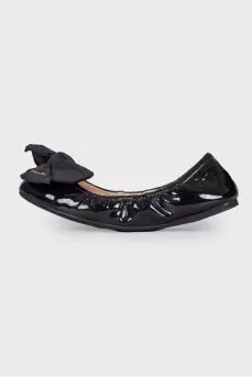 Black patent ballerinas with a large bow