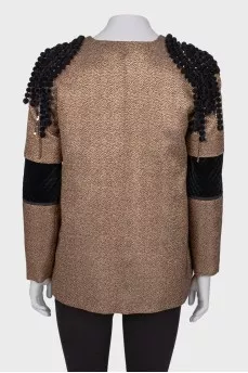Golden jacket with accent shoulders