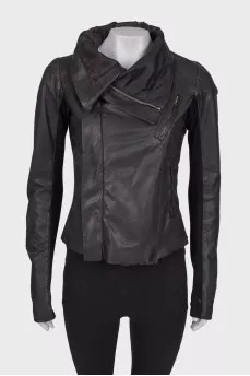 Leather jacket with knitwear on sleeves