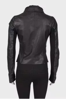 Leather jacket with knitwear on sleeves