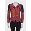 Tweed jacket with symmetrical applications