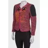 Tweed jacket with symmetrical applications