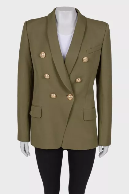 Green jacket with textured buttons