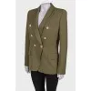 Green jacket with textured buttons