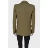 Green jacket with textured buttons