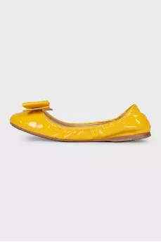 Жовті лакові балетки з бантом