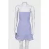 Lavender dress with frills on the back