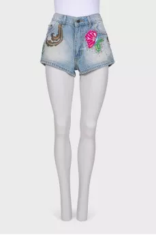 Denim shorts with applications