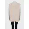 Knitted beige vest