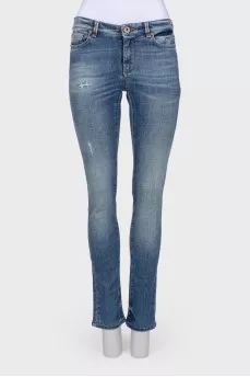 Jeans with the effect of torn and shabby