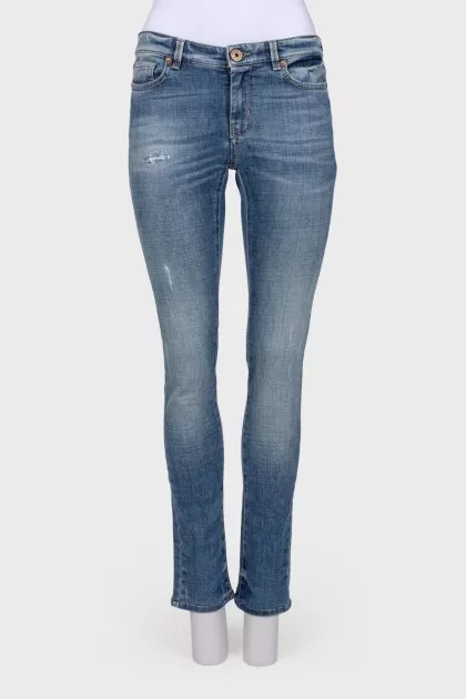 Jeans with the effect of torn and shabby
