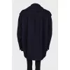 Blue coat with leather inserts