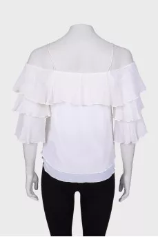 White top with frills