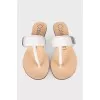 White leather flip-flops