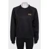 Black Sweatshot with brand's logo