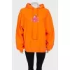 Orange hoodie with print