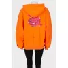 Orange hoodie with print